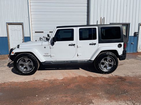 Used 2016 Jeep Wrangler Unlimited Sahara w/ Max Tow Package image 1