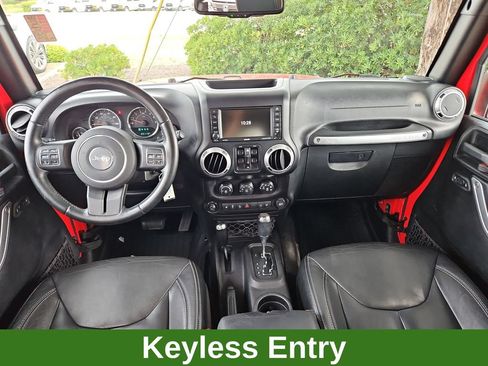 Used 2015 Jeep Wrangler Unlimited Sahara w/ Dual Top Group AWD/4WD image 9