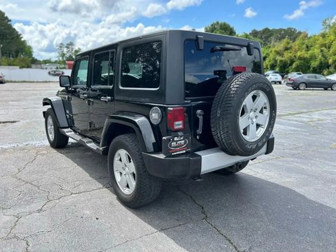 Used 2012 Jeep Wrangler Unlimited Sahara w/ Dual Top Group image 8