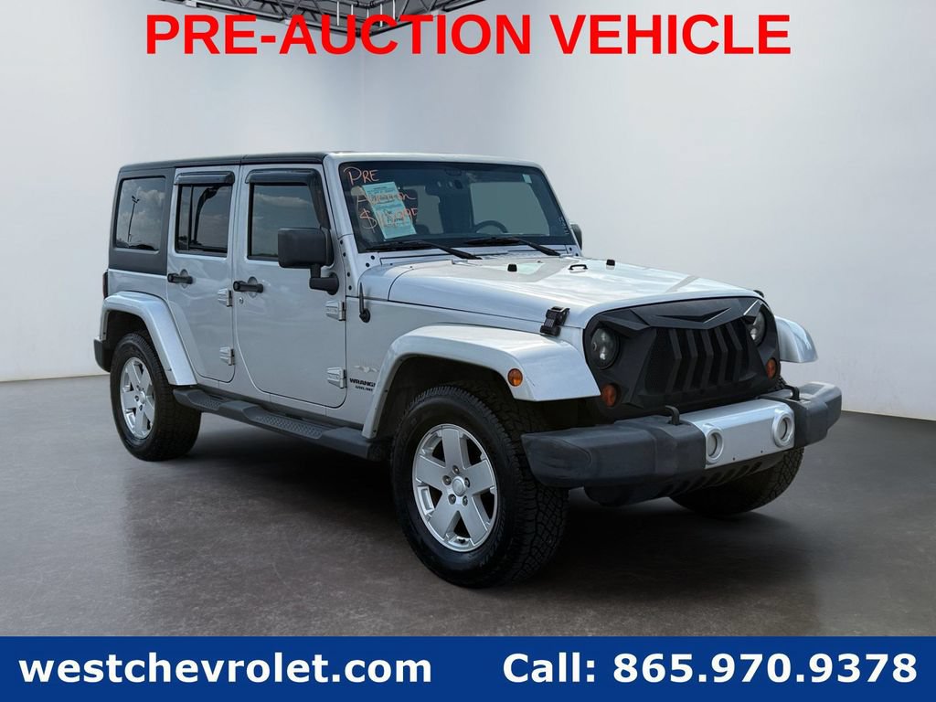 Used 2011 Jeep Wrangler Unlimited Sahara w/ Connectivity Group AWD/4WD image 1