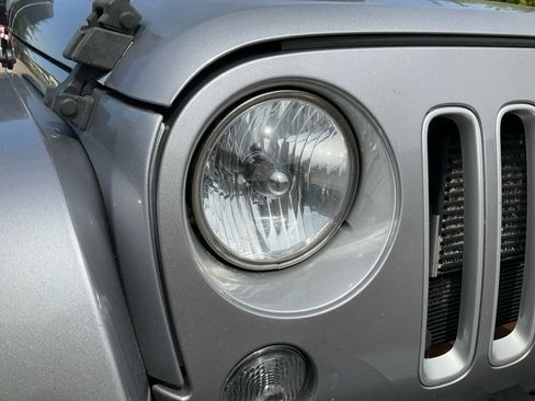 Used 2016 Jeep Wrangler Unlimited Sahara w/ Max Tow Package AWD/4WD image 25