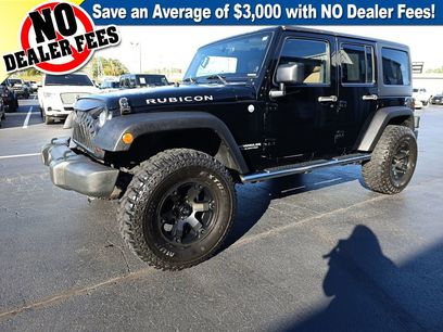 Used 2011 Jeep Wrangler Unlimited Rubicon w/ Dual Top Group
