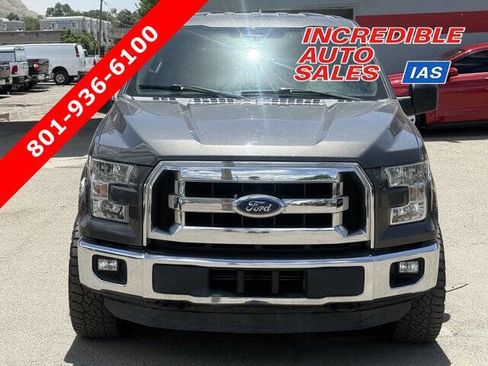 Used 2015 Ford F150 XLT AWD/4WD image 1