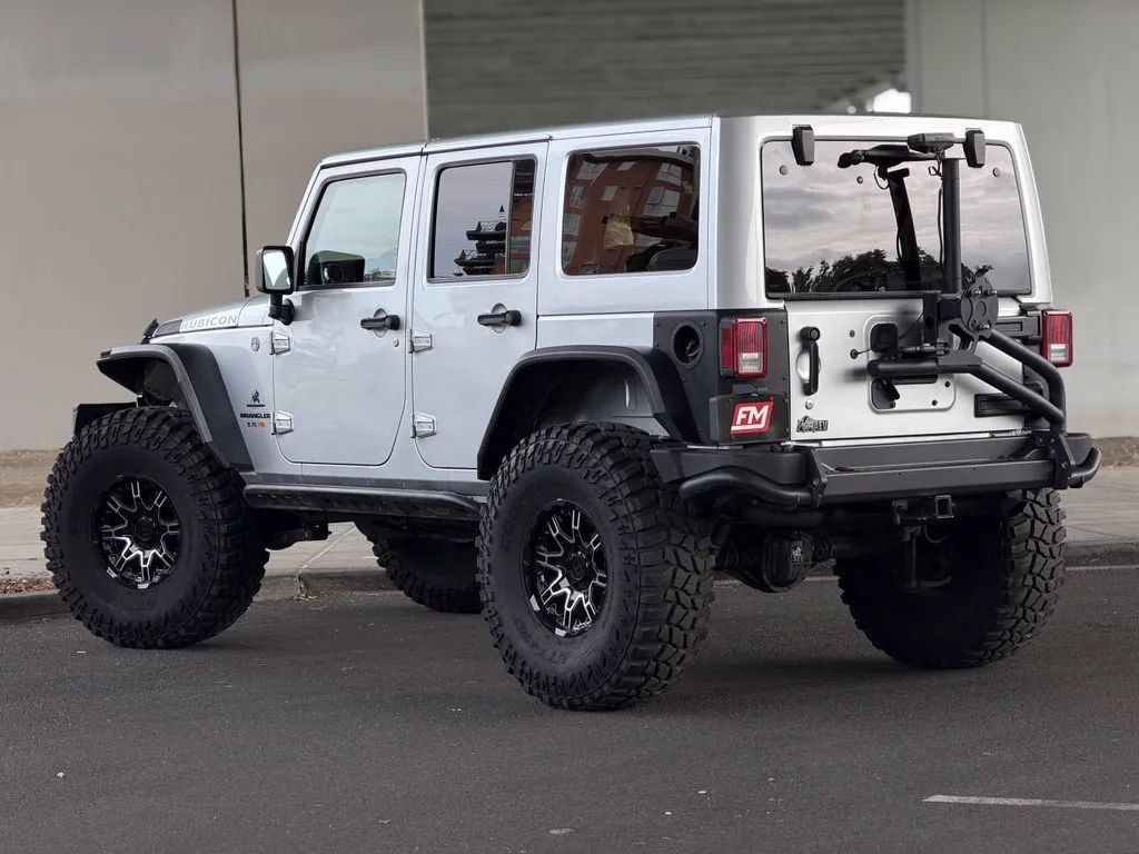 Used 2011 Jeep Wrangler Unlimited Rubicon w/ Dual Top Group AWD/4WD image 6