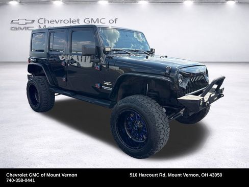 Used 2012 Jeep Wrangler Unlimited Sahara w/ Dual Top Group AWD/4WD image 9