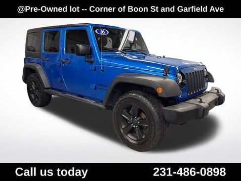 Used 2016 Jeep Wrangler Unlimited Sport w/ Mopar Black Appearance Group AWD/4WD image 12