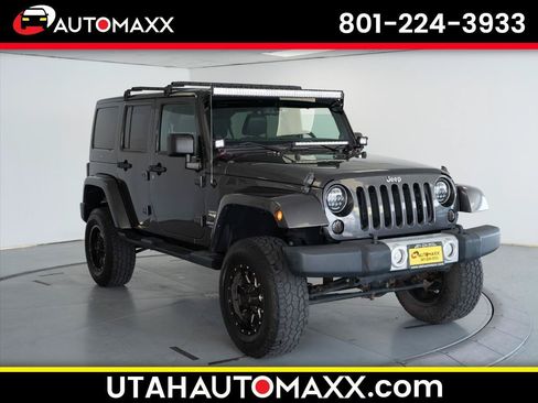 Used 2014 Jeep Wrangler Unlimited Sahara w/ Max Tow Package AWD/4WD image 1
