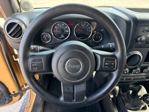 Used 2013 Jeep Wrangler Unlimited Sport w/ Mopar Black Appearance Group AWD/4WD image 21