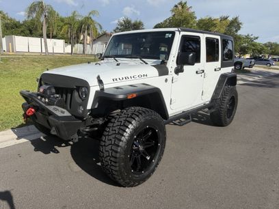 Used 2014 Jeep Wrangler Unlimited Rubicon w/ Dual Top Group