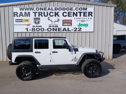Used 2012 Jeep Wrangler Unlimited Sport image 2