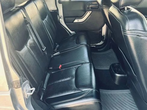 Used 2014 Jeep Wrangler Unlimited Sahara w/ Dual Top Group image 18