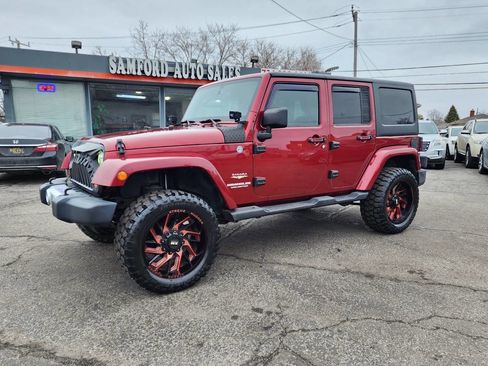 Used 2012 Jeep Wrangler Unlimited Sahara w/ Dual Top Group image 2