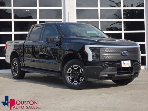 Used 2023 Ford F150 Lightning XLT AWD/4WD image 1