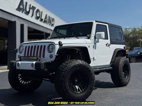 Used 2016 Jeep Wrangler Sahara w/ Connectivity Group AWD/4WD image 1