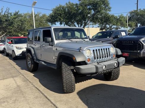 Used 2012 Jeep Wrangler Unlimited Sport AWD/4WD image 2