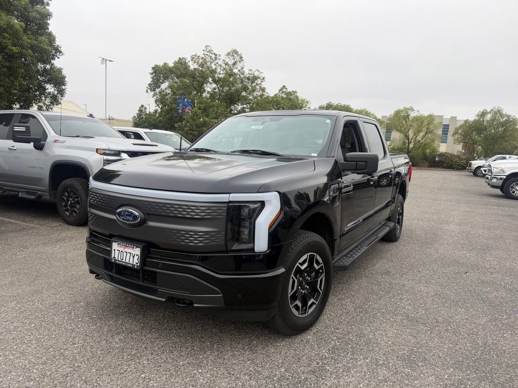 Used 2023 Ford F150 Lightning XLT AWD/4WD image 1