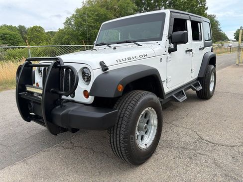 Used 2011 Jeep Wrangler Unlimited Rubicon w/ Dual Top Group AWD/4WD image 6