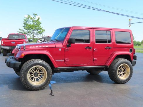 Used 2013 Jeep Wrangler Unlimited Rubicon w/ Dual Top Group AWD/4WD image 2
