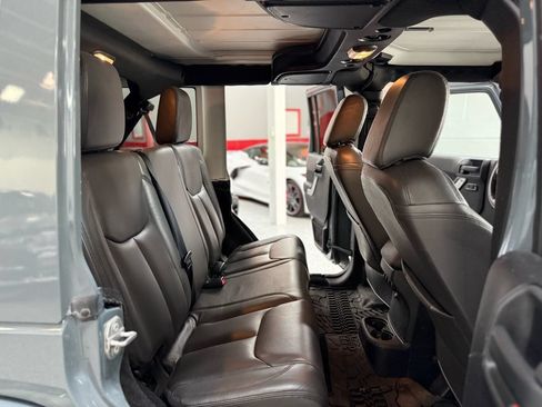 Used 2015 Jeep Wrangler Unlimited Sahara w/ Dual Top Group AWD/4WD image 22