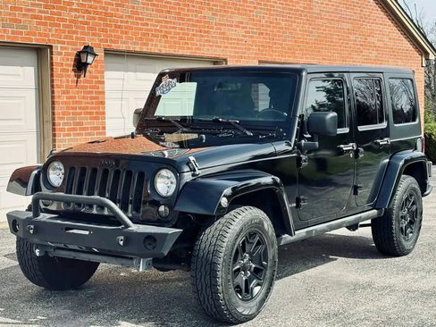 Used 2016 Jeep Wrangler Unlimited Sahara image 1