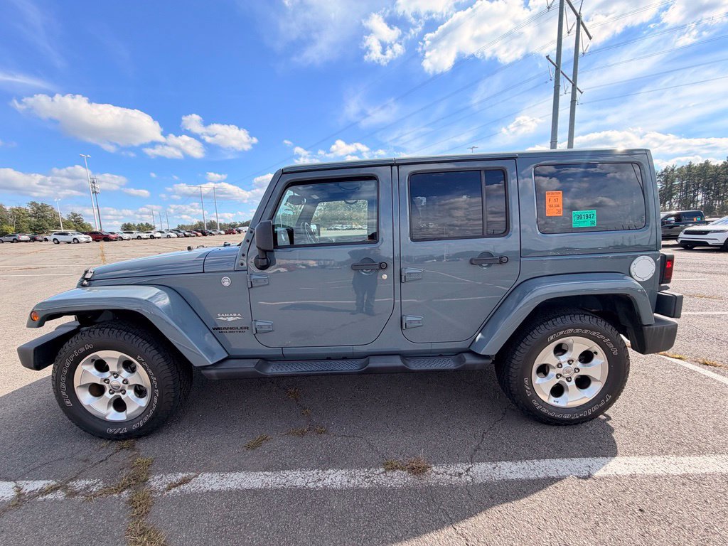 Used 2014 Jeep Wrangler Unlimited Sahara w/ Dual Top Group AWD/4WD image 5