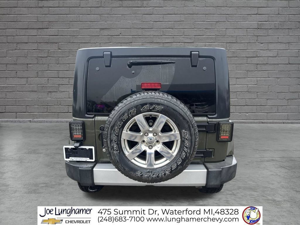 Used 2015 Jeep Wrangler Unlimited Sahara w/ Dual Top Group AWD/4WD image 4