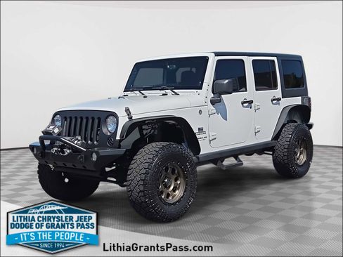 Used 2013 Jeep Wrangler Unlimited Sport AWD/4WD image 1