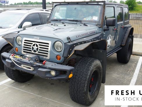 Used 2013 Jeep Wrangler Unlimited Rubicon AWD/4WD image 1