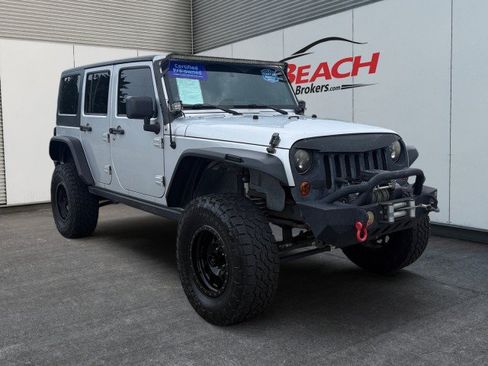 Used 2011 Jeep Wrangler Unlimited Sport AWD/4WD image 1
