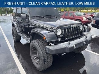 Used 2015 Jeep Wrangler Unlimited Rubicon w/ Max Tow Package AWD/4WD video 1