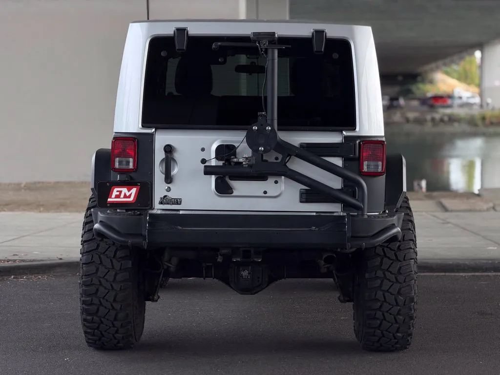 Used 2011 Jeep Wrangler Unlimited Rubicon w/ Dual Top Group AWD/4WD image 7