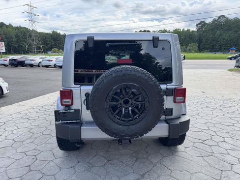 Used 2015 Jeep Wrangler Unlimited Sahara w/ Dual Top Group AWD/4WD image 11