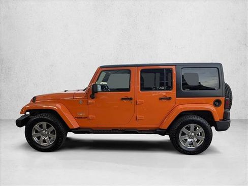Used 2012 Jeep Wrangler Unlimited Sahara w/ Dual Top Group image 9