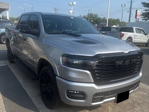 Used 2025 RAM 1500 Laramie w/ Night Edition AWD/4WD image 1