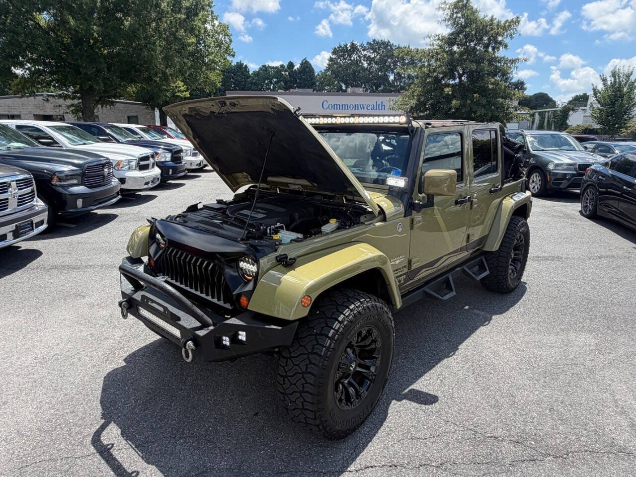 Used 2013 Jeep Wrangler Unlimited Sahara w/ Dual Top Group AWD/4WD image 31