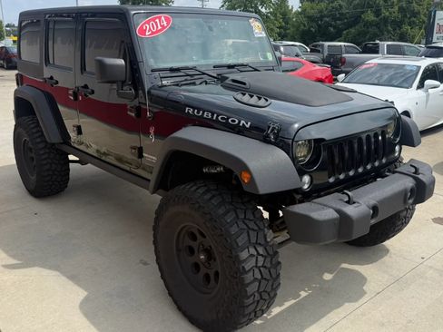 Used 2014 Jeep Wrangler Unlimited Rubicon w/ Dual Top Group AWD/4WD image 2