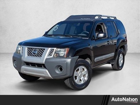 Used 2013 Nissan Xterra S image 1