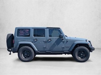Used 2015 Jeep Wrangler Unlimited Sahara AWD/4WD video 4