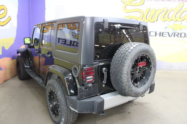 Used 2014 Jeep Wrangler Unlimited Sahara w/ Dual Top Group AWD/4WD image 6