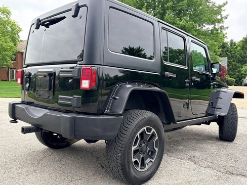 Used 2014 Jeep Wrangler Unlimited Sahara w/ Dual Top Group AWD/4WD image 8