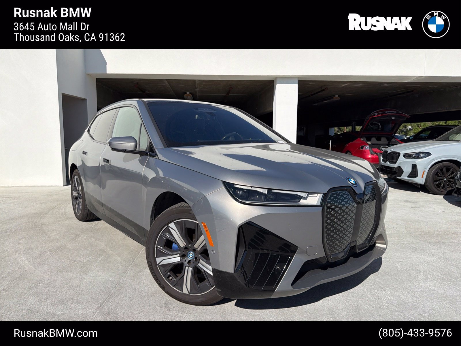 Certified 2024 BMW iX xDrive50 w/ Premium Package AWD/4WD image 1