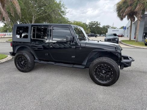 Used 2010 Jeep Wrangler Unlimited Sport AWD/4WD image 1