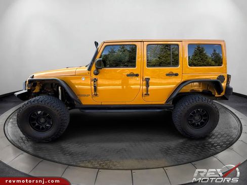 Used 2014 Jeep Wrangler Unlimited Sahara AWD/4WD image 2