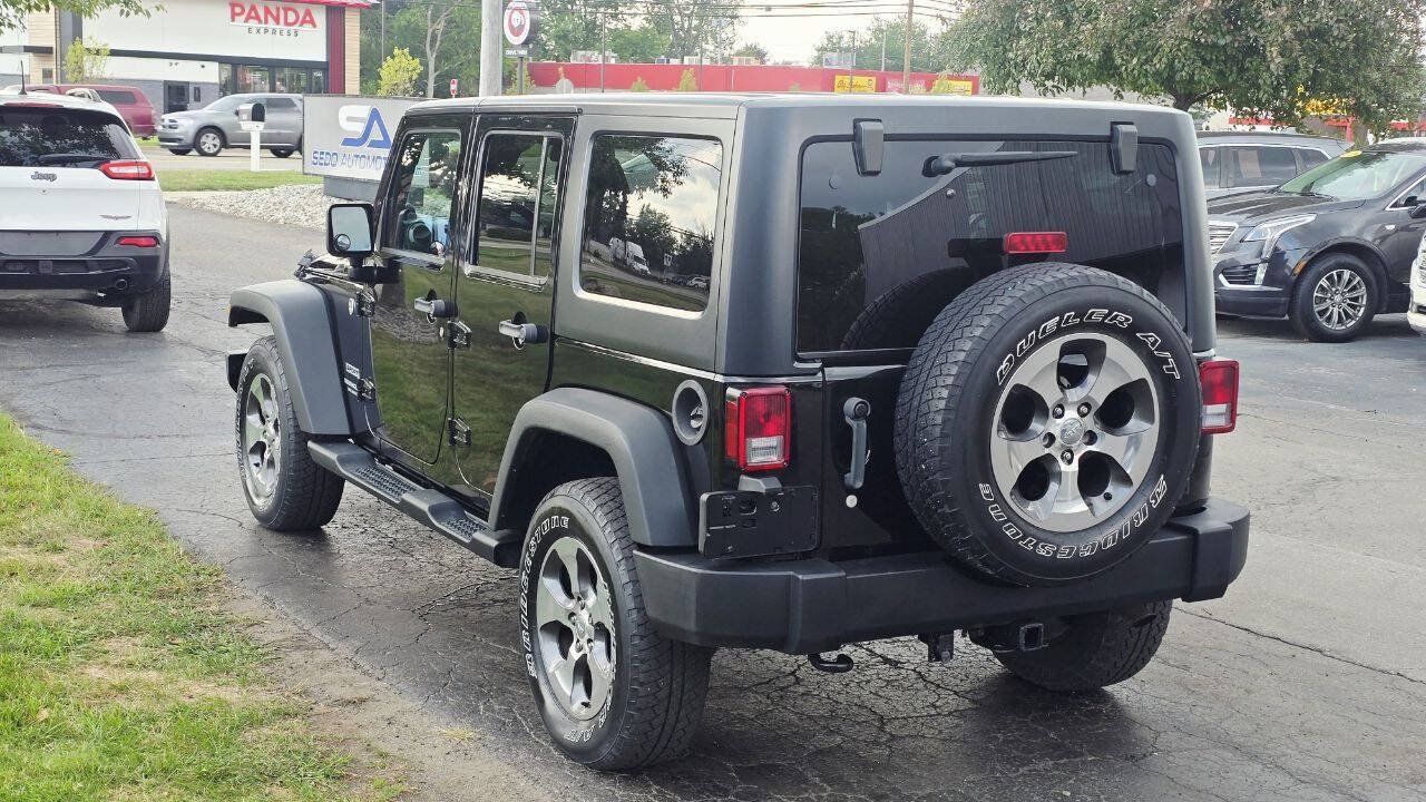 Used 2014 Jeep Wrangler Unlimited Sport w/ Dual Top Group AWD/4WD image 4