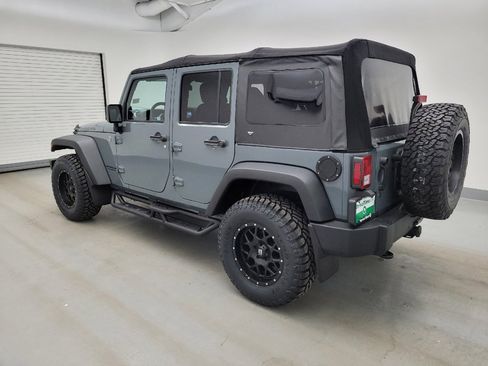 Used 2014 Jeep Wrangler Unlimited Rubicon w/ Dual Top Group AWD/4WD image 3