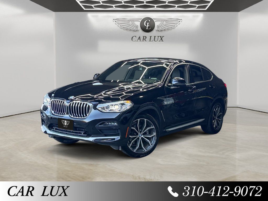 Used 2020 BMW X4 xDrive30i AWD/4WD image 1