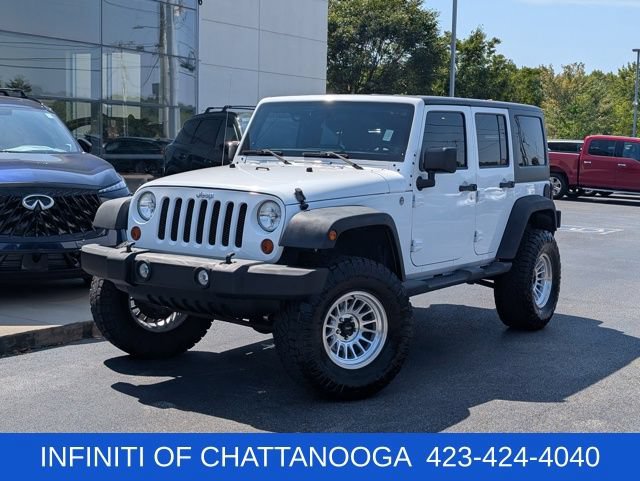 Used 2012 Jeep Wrangler Unlimited Sport AWD/4WD image 1