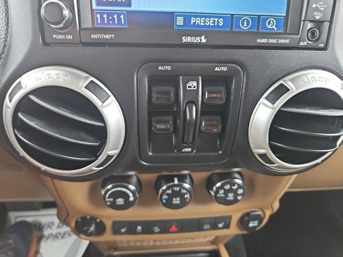 Used 2012 Jeep Wrangler Unlimited Sahara w/ Dual Top Group AWD/4WD image 30