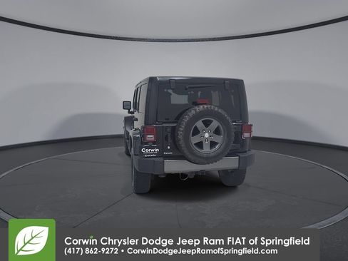 Used 2011 Jeep Wrangler Unlimited Sport w/ Connectivity Group AWD/4WD image 12