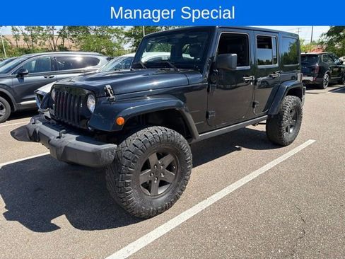 Used 2015 Jeep Wrangler Unlimited Sahara AWD/4WD image 1